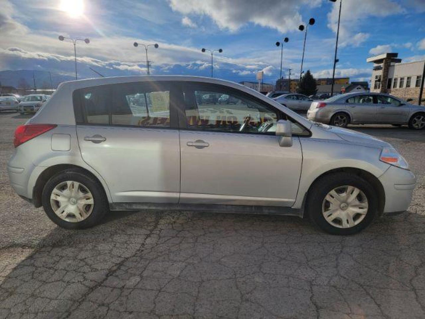 2011 Nissan Versa 1.8 SL Hatchback (3N1BC1CP7BL) with an 1.8L L4 DOHC 16V engine, Continuously Variable Transmission transmission, located at 1800 West Broadway, Missoula, 59808, (406) 543-1986, 46.881348, -114.023628 - Photo#2