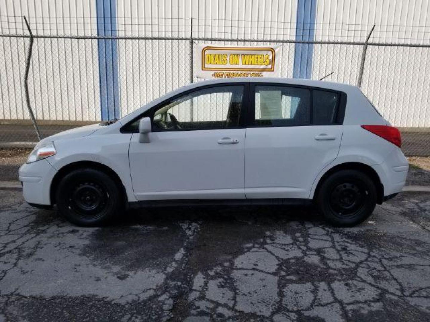 2011 Nissan Versa 1.8 SL Hatchback (3N1BC1CP2BL) with an 1.8L L4 DOHC 16V engine, Continuously Variable Transmission transmission, located at 1800 West Broadway, Missoula, 59808, (406) 543-1986, 46.881348, -114.023628 - Photo#2