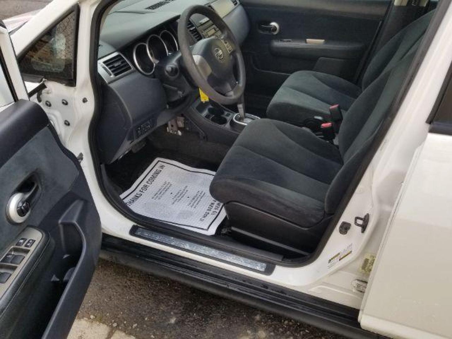 2011 Nissan Versa 1.8 SL Hatchback (3N1BC1CP2BL) with an 1.8L L4 DOHC 16V engine, Continuously Variable Transmission transmission, located at 1800 West Broadway, Missoula, 59808, (406) 543-1986, 46.881348, -114.023628 - Photo#7