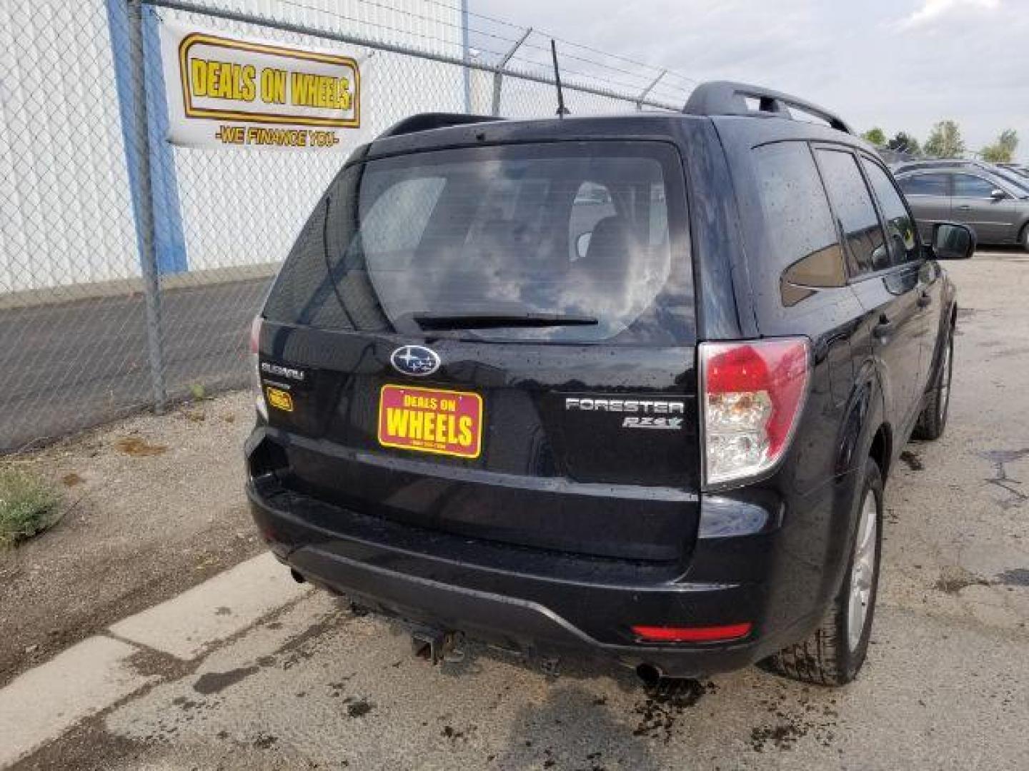 2011 Subaru Forester 2.5X Touring (JF2SHABC4BH) with an 2.5L H4 SOHC 16V engine, 4-Speed Automatic transmission, located at 4047 Montana Ave., Billings, MT, 59101, 45.770847, -108.529800 - Photo#4