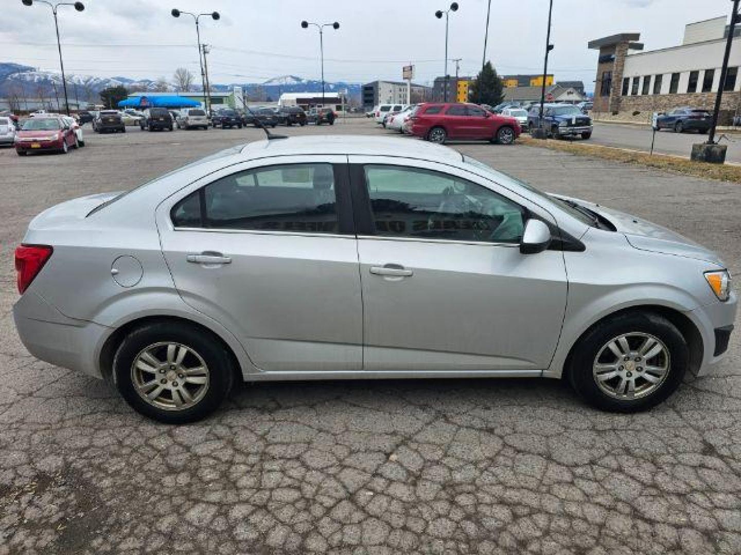 2012 Chevrolet Sonic 1LT Sedan (1G1JD5SH2C4) with an 1.8L L4 DOHC 24V engine, located at 1800 West Broadway, Missoula, 59808, (406) 543-1986, 46.881348, -114.023628 - Photo#4