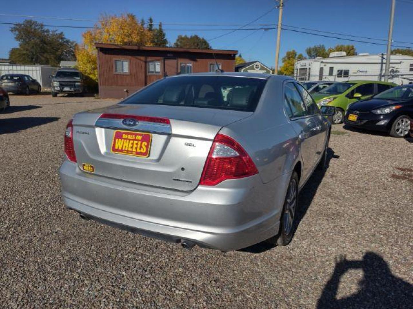 2012 Ford Fusion SEL (3FAHP0JG9CR) with an 3.0L V6 DOHC 24V engine, located at 4801 10th Ave S,, Great Falls, MT, 59405, 0.000000, 0.000000 - Photo#4