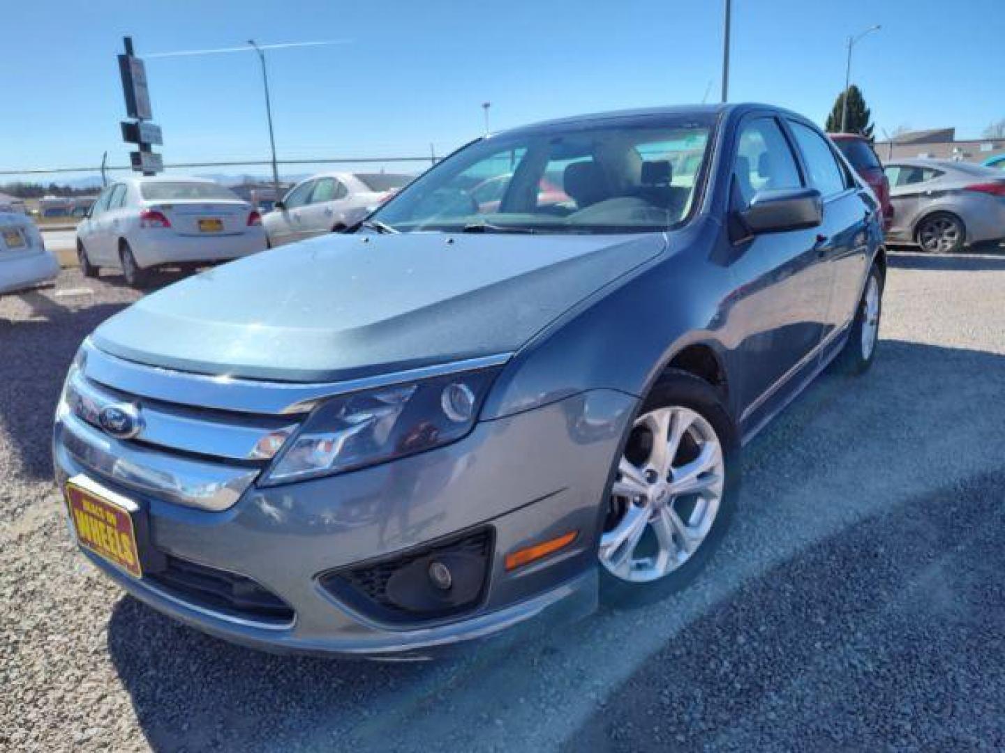 2012 Ford Fusion SE (3FAHP0HA0CR) with an 2.5L L4 DOHC 16V engine, located at 4801 10th Ave S,, Great Falls, MT, 59405, 0.000000, 0.000000 - Photo#0