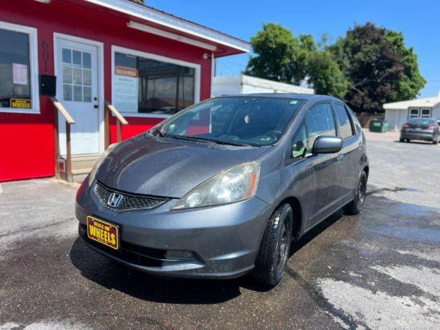 2012 Honda Fit 5-Speed MT (JHMGE8G34CC) with an 1.5L L4 SOHC 16V engine, 5-Speed Manual transmission, located at 601 E. Idaho St., Kalispell, MT, 59901, 0.000000, 0.000000 - Photo#0