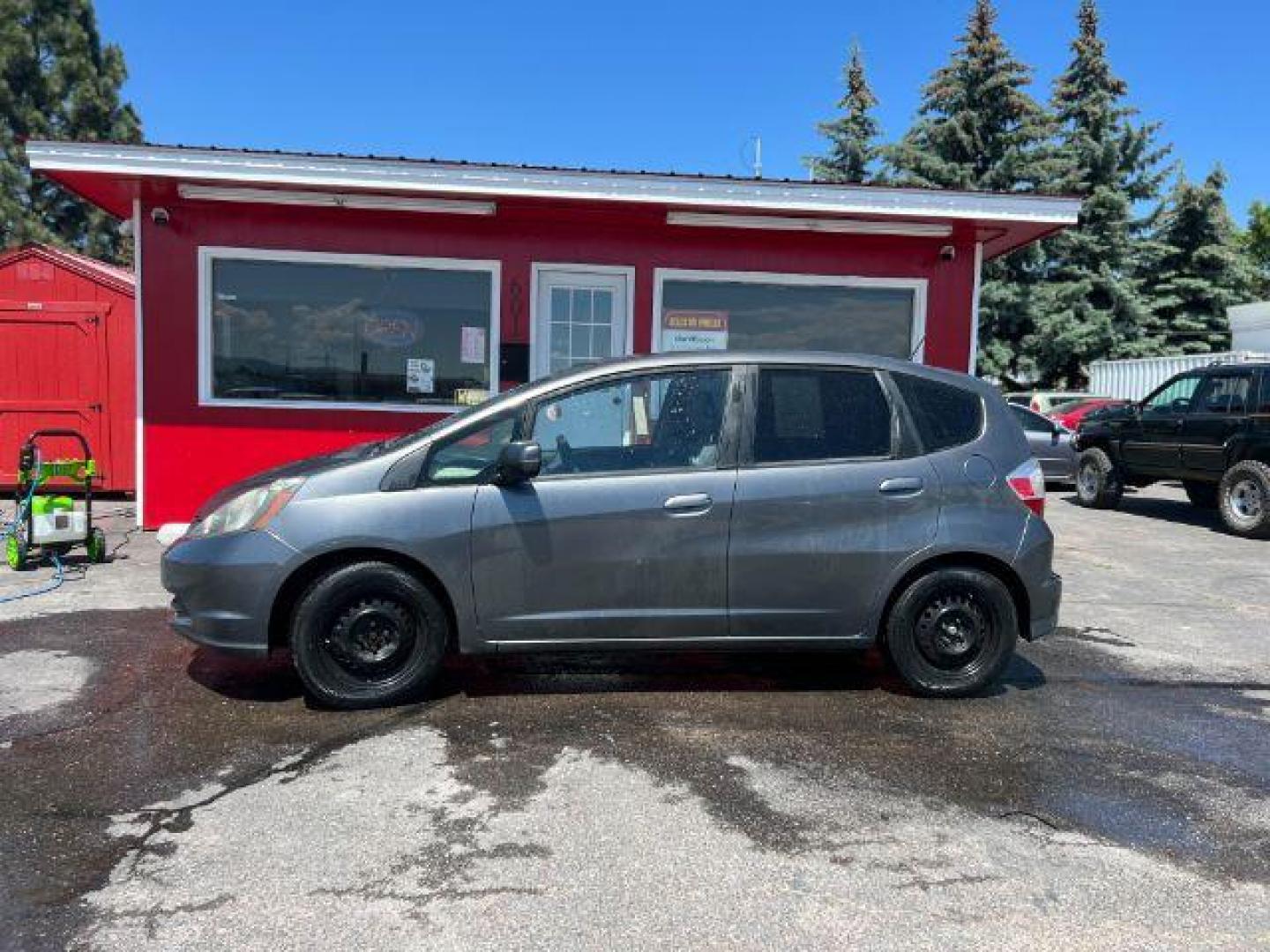 2012 Honda Fit 5-Speed MT (JHMGE8G34CC) with an 1.5L L4 SOHC 16V engine, 5-Speed Manual transmission, located at 601 E. Idaho St., Kalispell, MT, 59901, 0.000000, 0.000000 - Photo#1