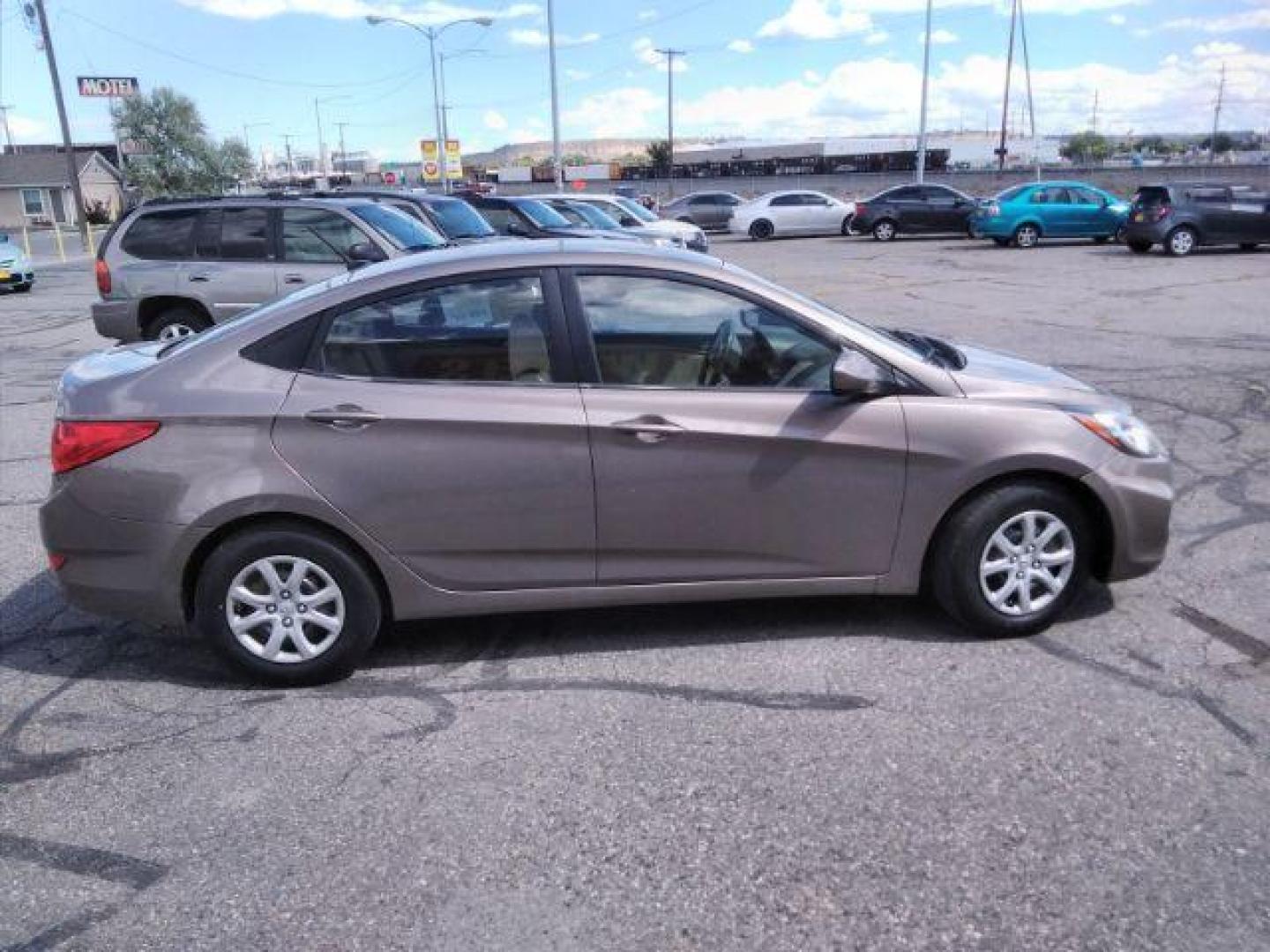 2012 Hyundai Accent GLS 4-Door (KMHCT4AE1CU) with an 1.6L L4 DOHC 16V engine, located at 4047 Montana Ave., Billings, MT, 59101, 45.770847, -108.529800 - Photo#4