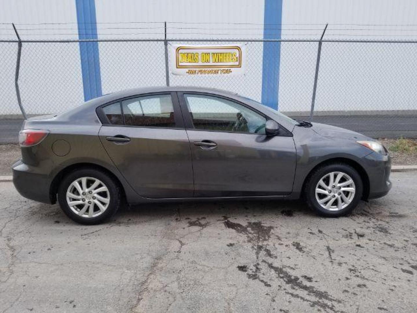 2012 Mazda MAZDA3 i Touring 4-Door (JM1BL1V86C1) with an 2.0L L4 DOHC 16V engine, located at 4047 Montana Ave., Billings, MT, 59101, 45.770847, -108.529800 - Photo#5