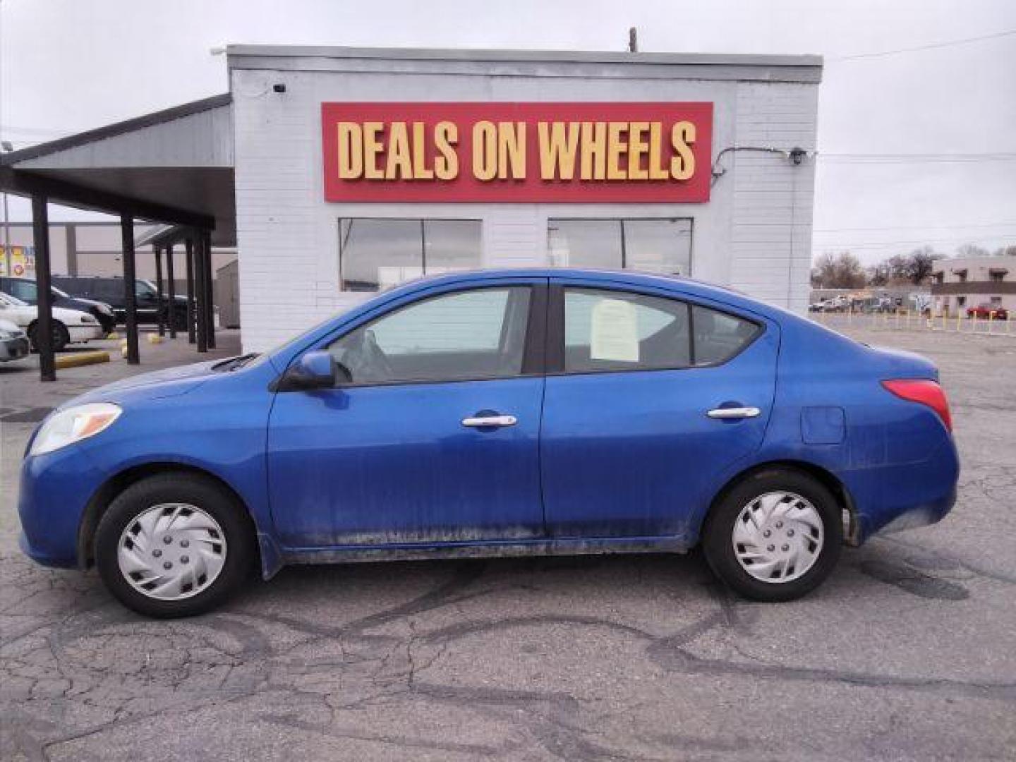 2012 Nissan Versa 1.6 SV Sedan (3N1CN7AP3CL) with an 1.6L L4 DOHC 16V engine, located at 4047 Montana Ave., Billings, MT, 59101, 45.770847, -108.529800 - Photo#0