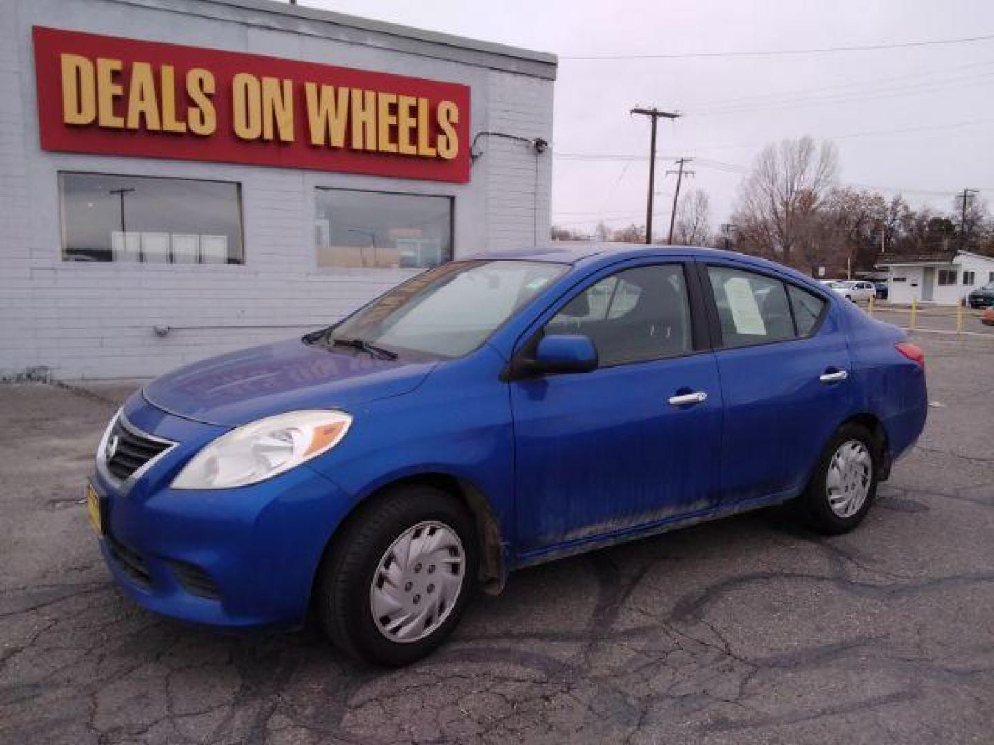 2012 Nissan Versa 1.6 SV Sedan (3N1CN7AP3CL) with an 1.6L L4 DOHC 16V engine, located at 4047 Montana Ave., Billings, MT, 59101, 45.770847, -108.529800 - Photo#1