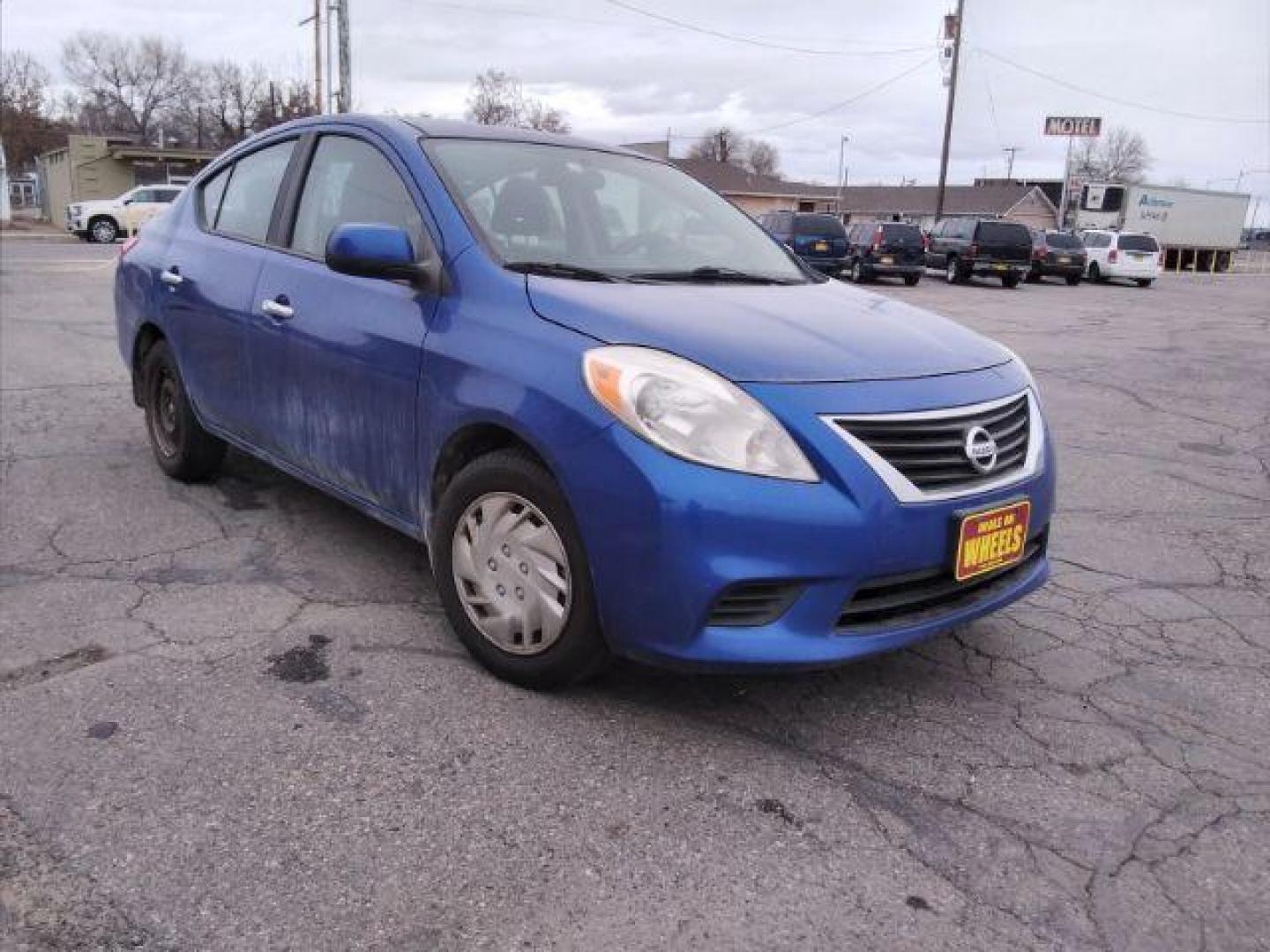 2012 Nissan Versa 1.6 SV Sedan (3N1CN7AP3CL) with an 1.6L L4 DOHC 16V engine, located at 4047 Montana Ave., Billings, MT, 59101, 45.770847, -108.529800 - Photo#3