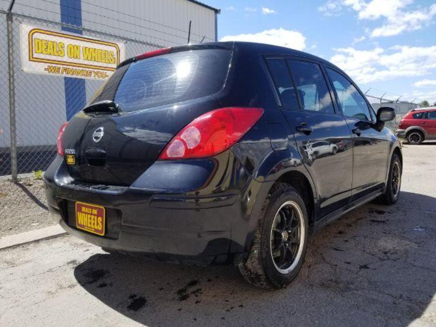 2012 Nissan Versa 1.8 SL Hatchback (3N1BC1CP7CK) with an 1.8L L4 DOHC 16V engine, Continuously Variable Transmission transmission, located at 4047 Montana Ave., Billings, MT, 59101, 45.770847, -108.529800 - Photo#4