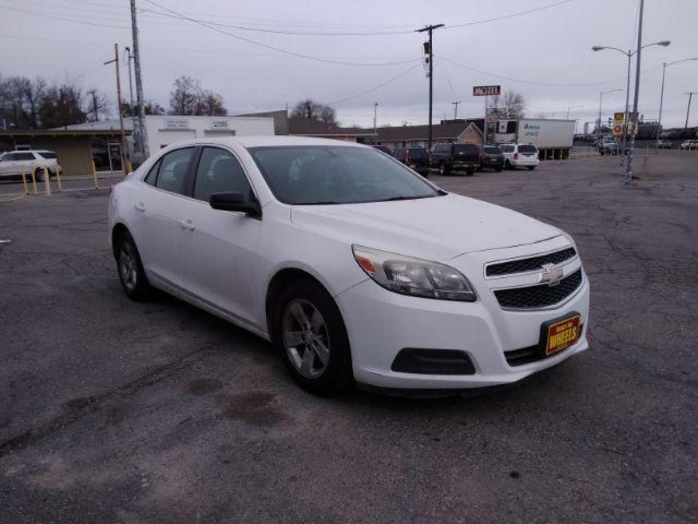 2013 Summit White Chevrolet Malibu LS (1G11B5SAXDF) with an 2.5L L4 DOHC 16V engine, 6-Speed Automatic transmission, located at 4047 Montana Ave., Billings, MT, 59101, 45.770847, -108.529800 - Photo#3