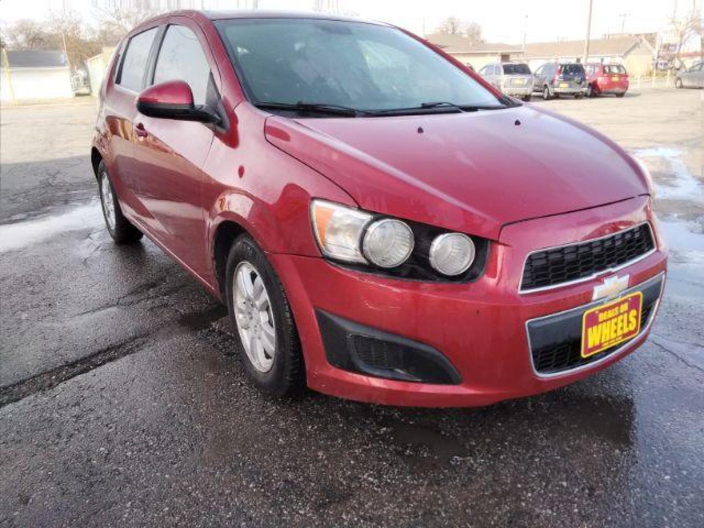 2013 Chevrolet Sonic LT Auto 5-Door (1G1JC6SB3D4) with an 1.4L L4 DOHC 24V TURBO engine, 6-Speed Automatic transmission, located at 4047 Montana Ave., Billings, MT, 59101, 45.770847, -108.529800 - Photo#2