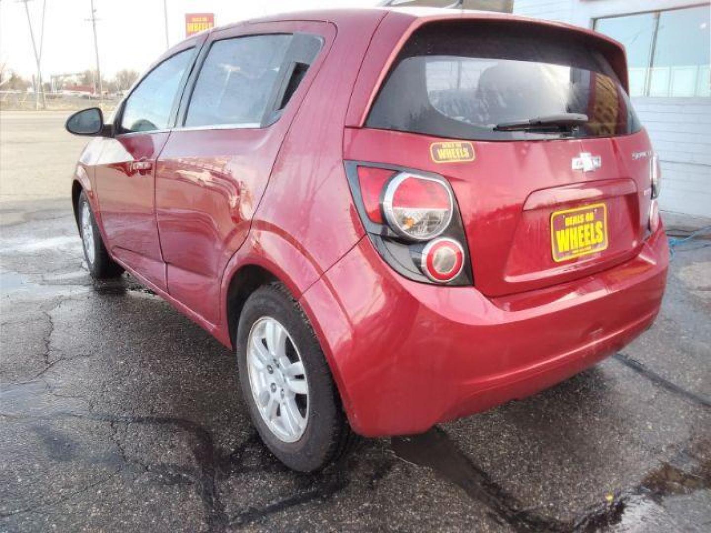 2013 Chevrolet Sonic LT Auto 5-Door (1G1JC6SB3D4) with an 1.4L L4 DOHC 24V TURBO engine, 6-Speed Automatic transmission, located at 4047 Montana Ave., Billings, MT, 59101, 45.770847, -108.529800 - Photo#6