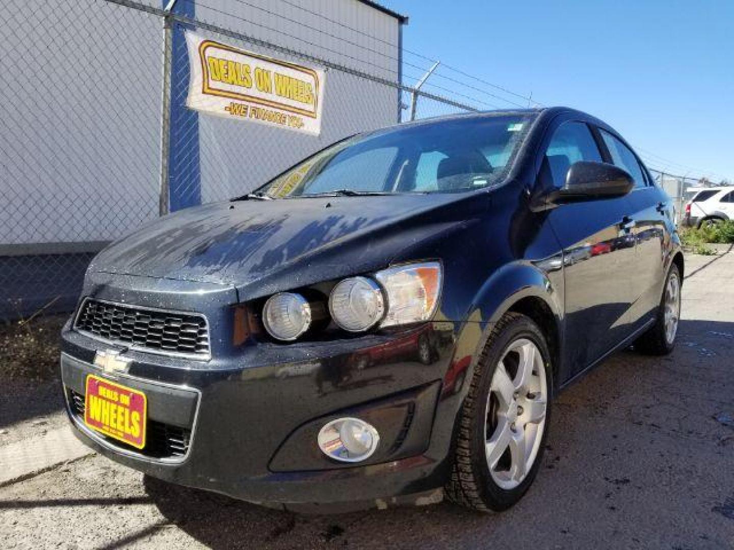 2013 Chevrolet Sonic LTZ Auto Sedan (1G1JE5SB4D4) with an 1.4L L4 DOHC 24V TUR engine, 6-Speed Automatic transmission, located at 601 E. Idaho St., Kalispell, MT, 59901, 0.000000, 0.000000 - Photo#0