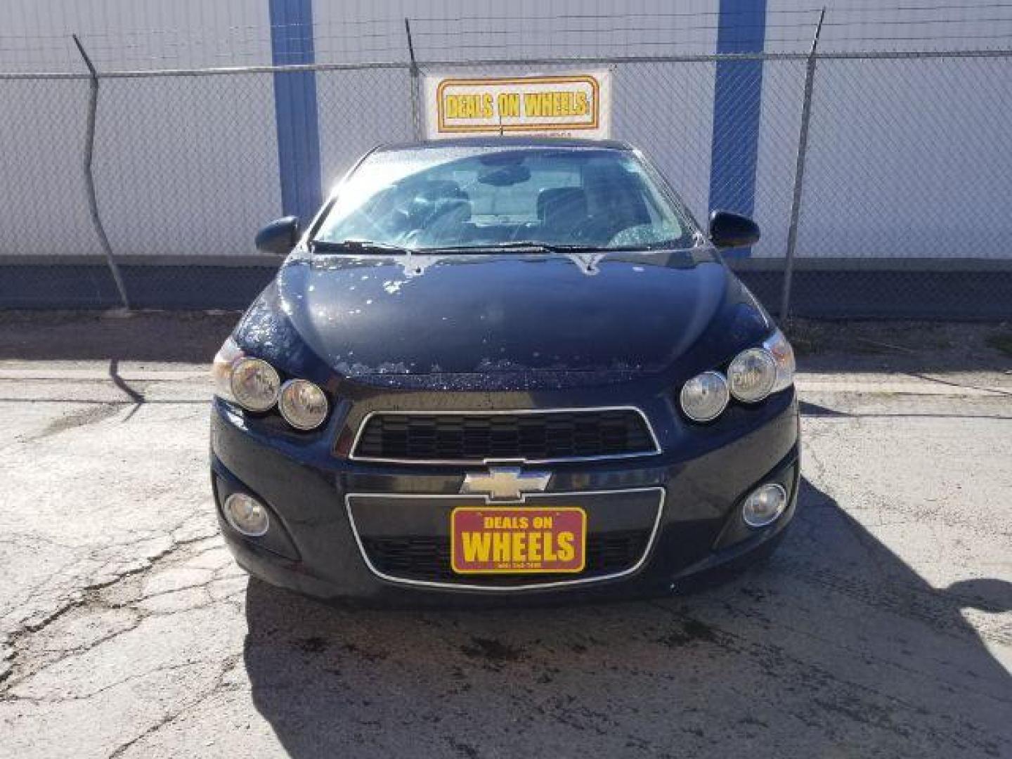 2013 Chevrolet Sonic LTZ Auto Sedan (1G1JE5SB4D4) with an 1.4L L4 DOHC 24V TUR engine, 6-Speed Automatic transmission, located at 601 E. Idaho St., Kalispell, MT, 59901, 0.000000, 0.000000 - Photo#1