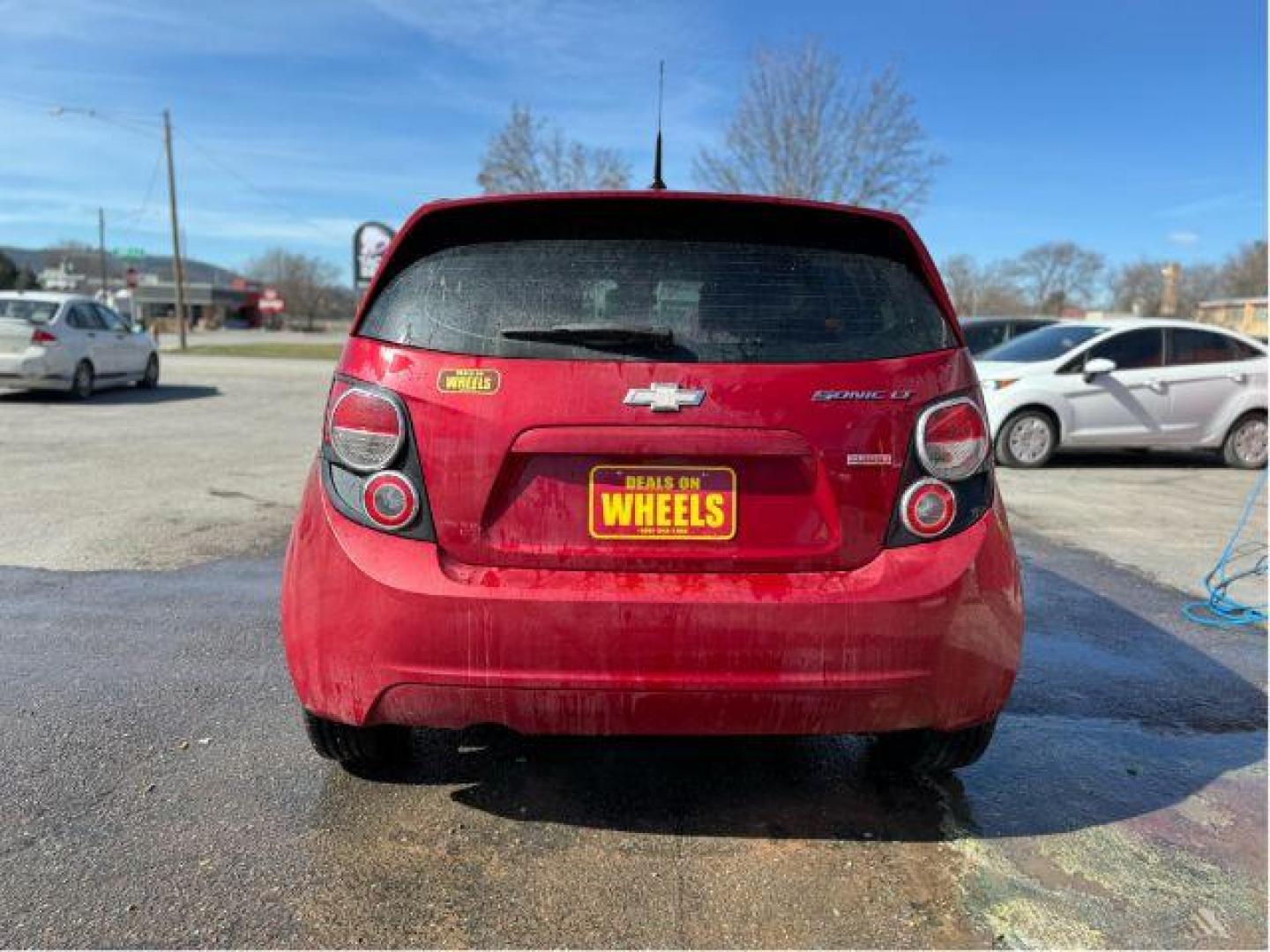 2013 Chevrolet Sonic LT Auto 5-Door (1G1JC6SB7D4) with an 1.4L L4 DOHC 24V TURBO engine, 6-Speed Automatic transmission, located at 601 E. Idaho St., Kalispell, MT, 59901, 0.000000, 0.000000 - Photo#4