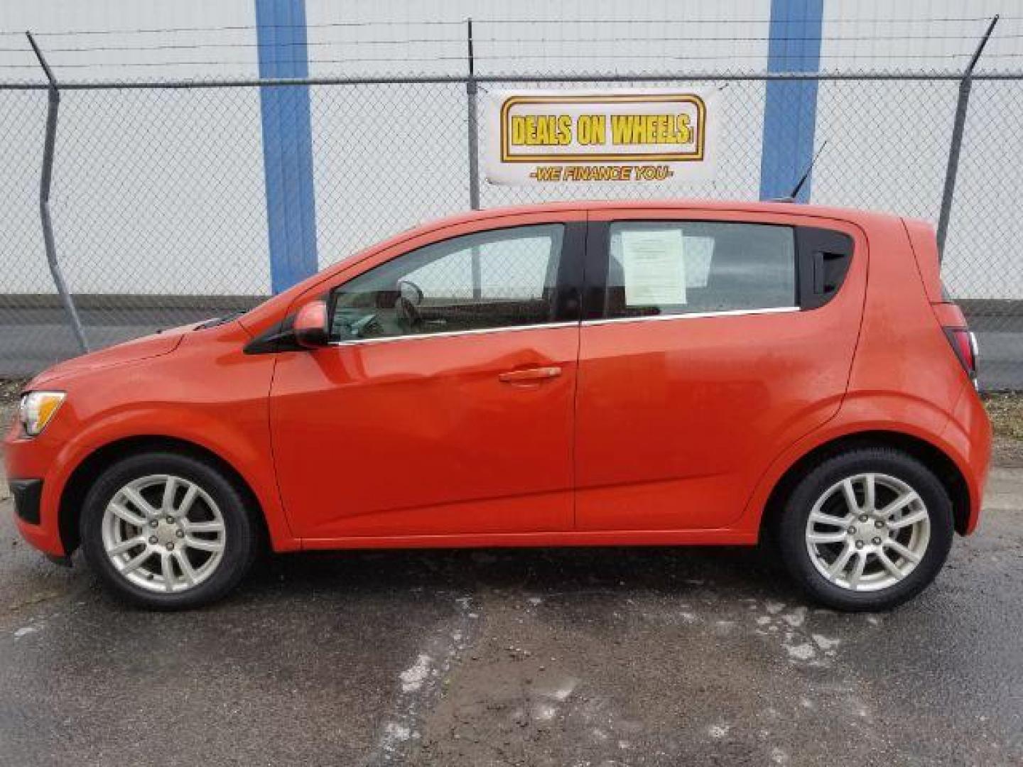 2013 Chevrolet Sonic LT Auto 5-Door (1G1JC6SH9D4) with an 1.8L L4 DOHC 24V engine, 6-Speed Automatic transmission, located at 601 E. Idaho St., Kalispell, MT, 59901, 0.000000, 0.000000 - Photo#2