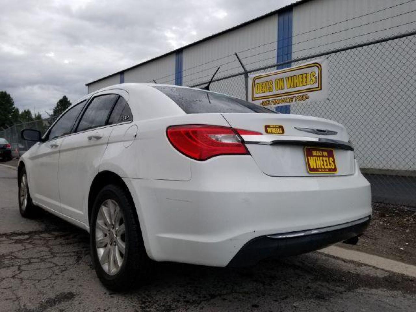 2013 Bright White Chrysler 200 Touring (1C3CCBBB4DN) with an 2.4L L4 DOHC 16V engine, 6-Speed Automatic transmission, located at 4801 10th Ave S,, Great Falls, MT, 59405, 0.000000, 0.000000 - Photo#3