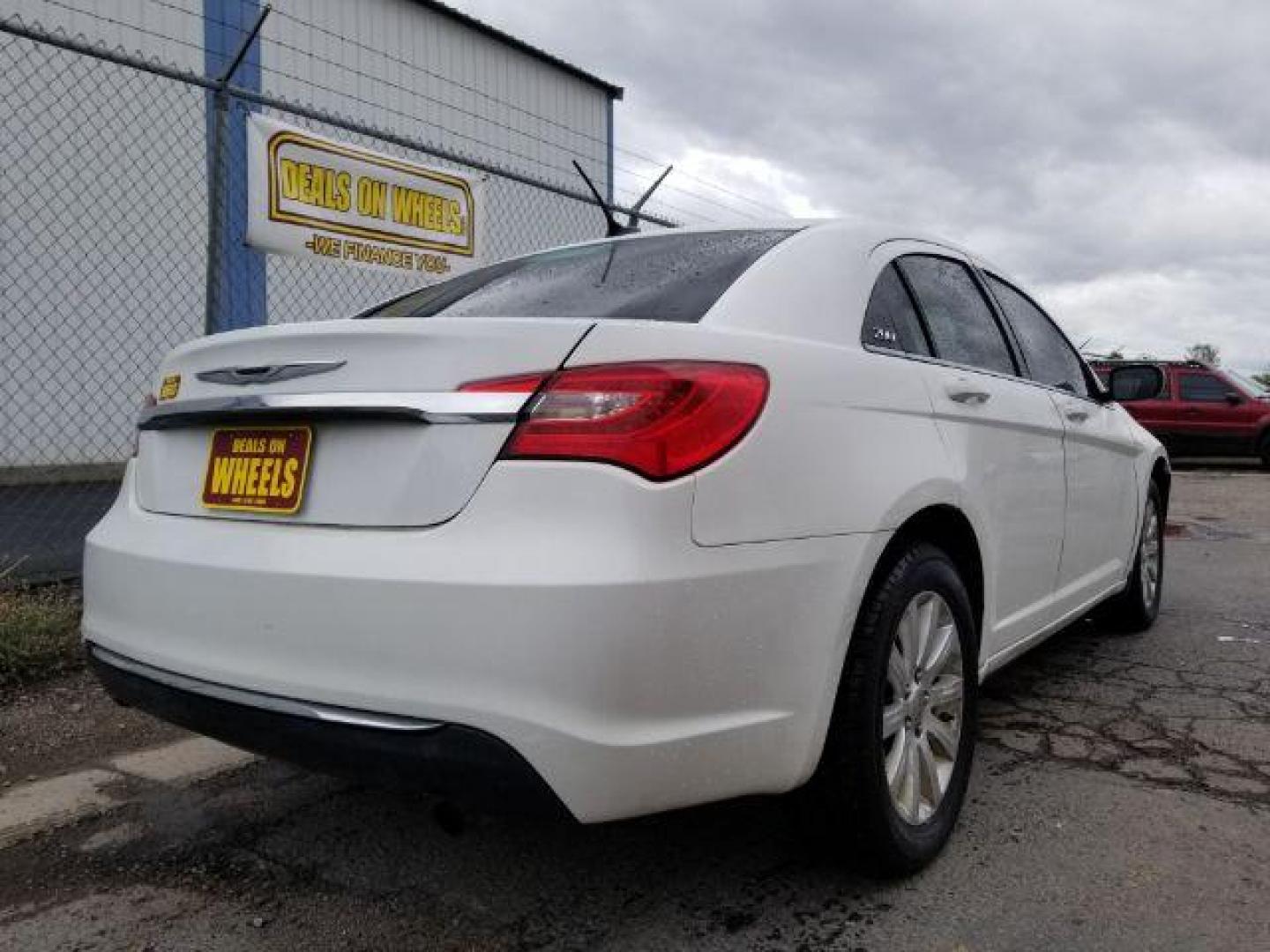 2013 Bright White Chrysler 200 Touring (1C3CCBBB4DN) with an 2.4L L4 DOHC 16V engine, 6-Speed Automatic transmission, located at 4801 10th Ave S,, Great Falls, MT, 59405, 0.000000, 0.000000 - Photo#4