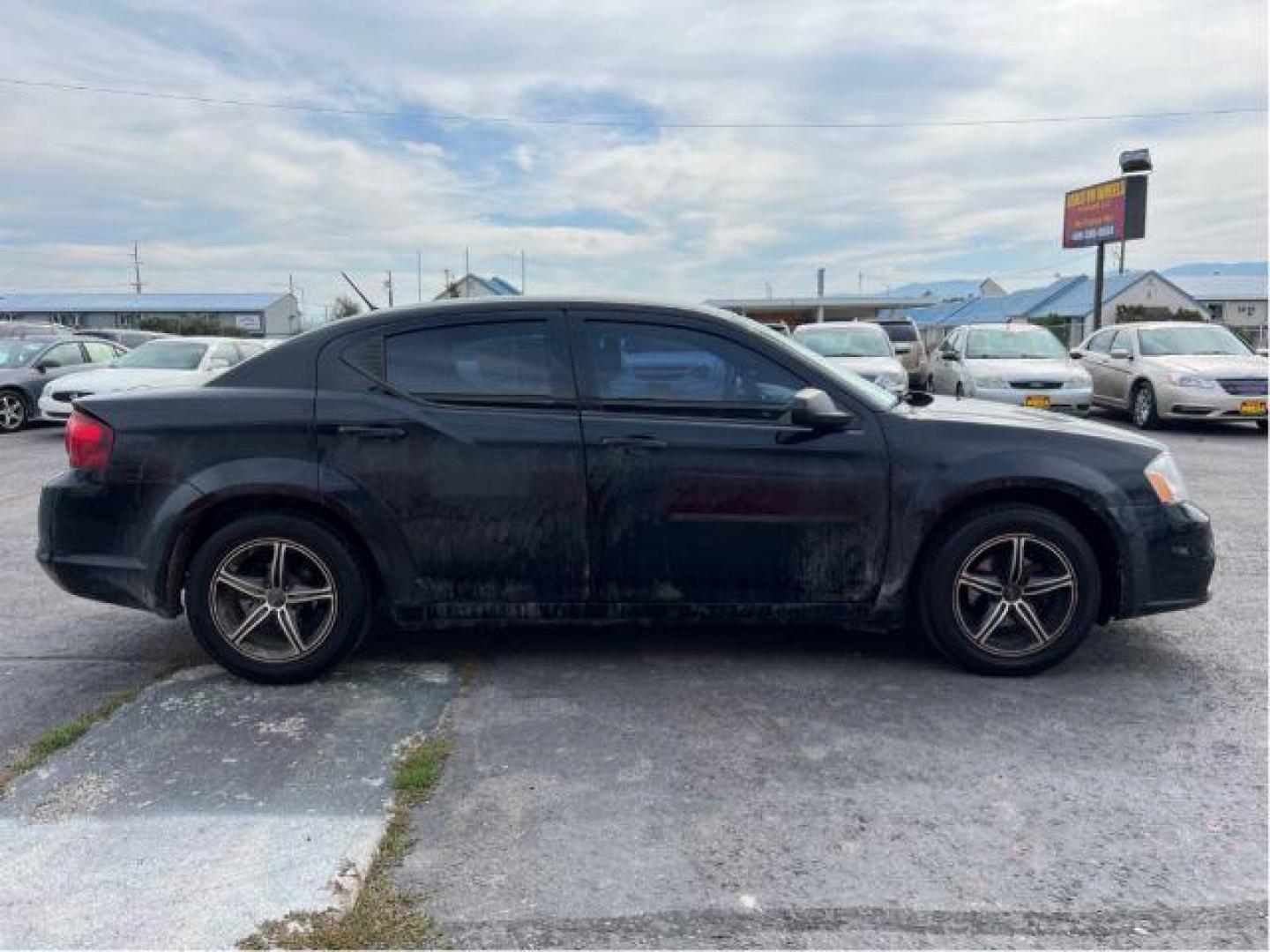 2013 Dodge Avenger Base (1C3CDZAB3DN) with an 2.4L L4 DOHC 16V engine, 4-Speed Automatic transmission, located at 4047 Montana Ave., Billings, MT, 59101, 45.770847, -108.529800 - Photo#5