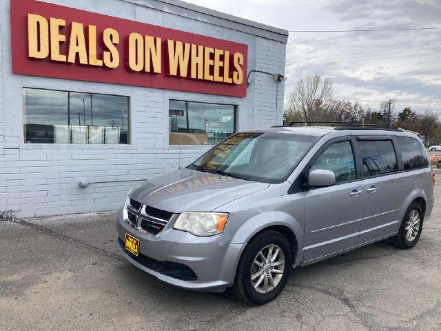 2013 Dodge Grand Caravan SXT (2C4RDGCG8DR) with an 3.6L V6 DOHC 24V engine, 6-Speed Automatic transmission, located at 4047 Montana Ave., Billings, MT, 59101, 45.770847, -108.529800 - Photo#0