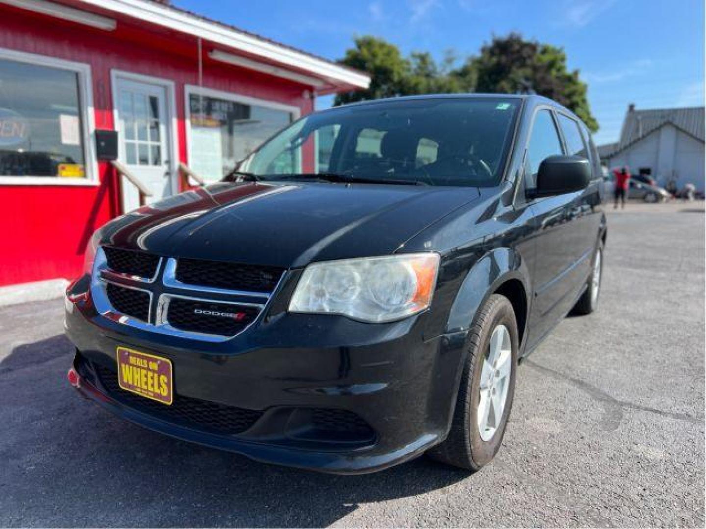 2013 Dodge Grand Caravan SE (2C4RDGBG5DR) with an 3.6L V6 DOHC 24V engine, 6-Speed Automatic transmission, located at 601 E. Idaho St., Kalispell, MT, 59901, 0.000000, 0.000000 - Photo#0