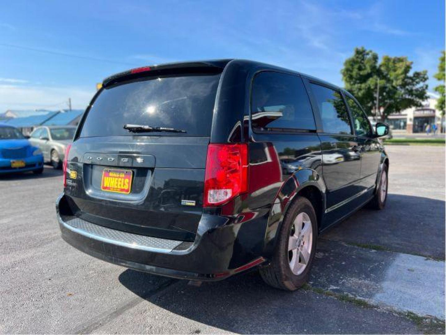 2013 Dodge Grand Caravan SE (2C4RDGBG5DR) with an 3.6L V6 DOHC 24V engine, 6-Speed Automatic transmission, located at 601 E. Idaho St., Kalispell, MT, 59901, 0.000000, 0.000000 - Photo#4