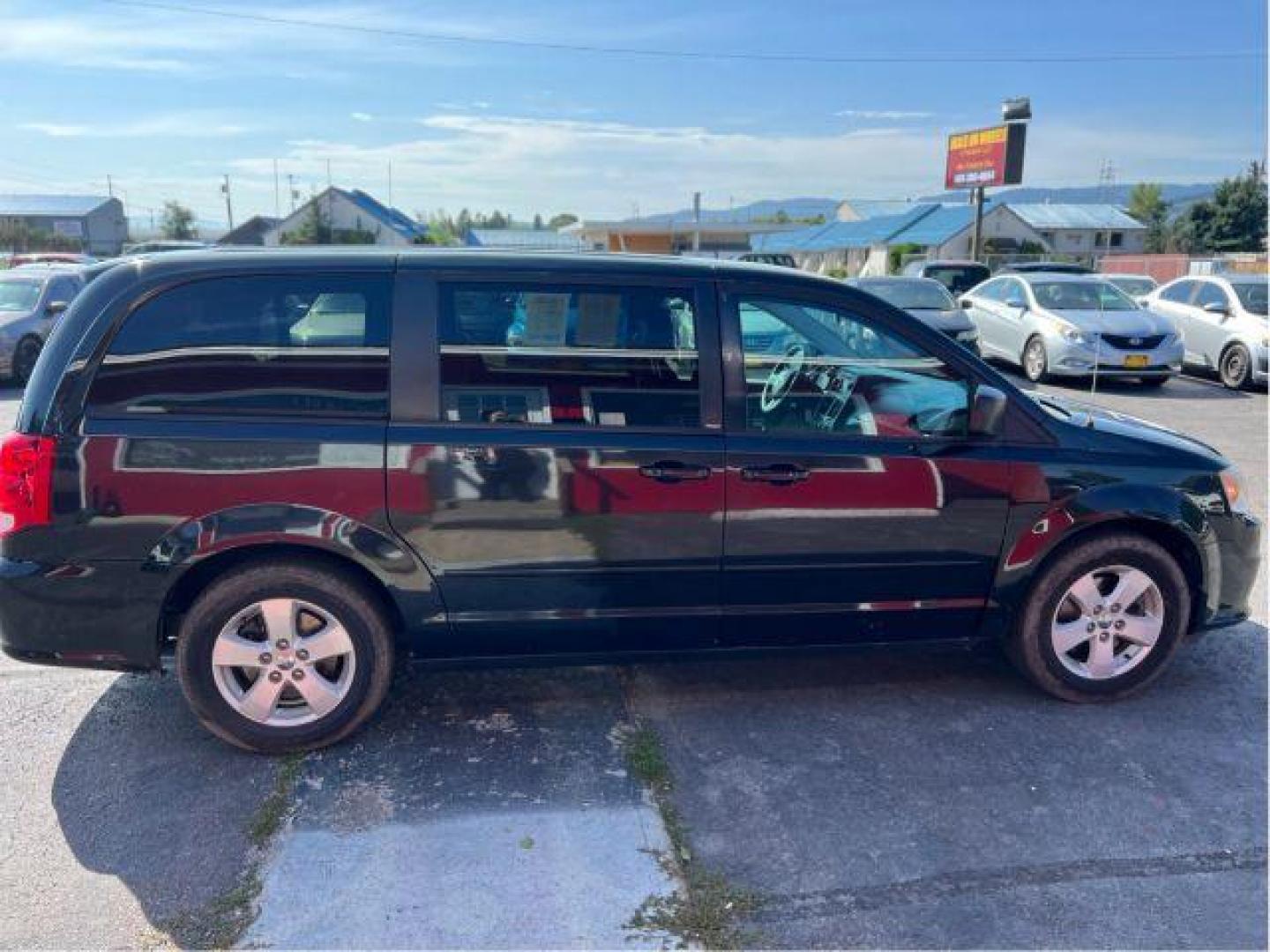 2013 Dodge Grand Caravan SE (2C4RDGBG5DR) with an 3.6L V6 DOHC 24V engine, 6-Speed Automatic transmission, located at 601 E. Idaho St., Kalispell, MT, 59901, 0.000000, 0.000000 - Photo#5