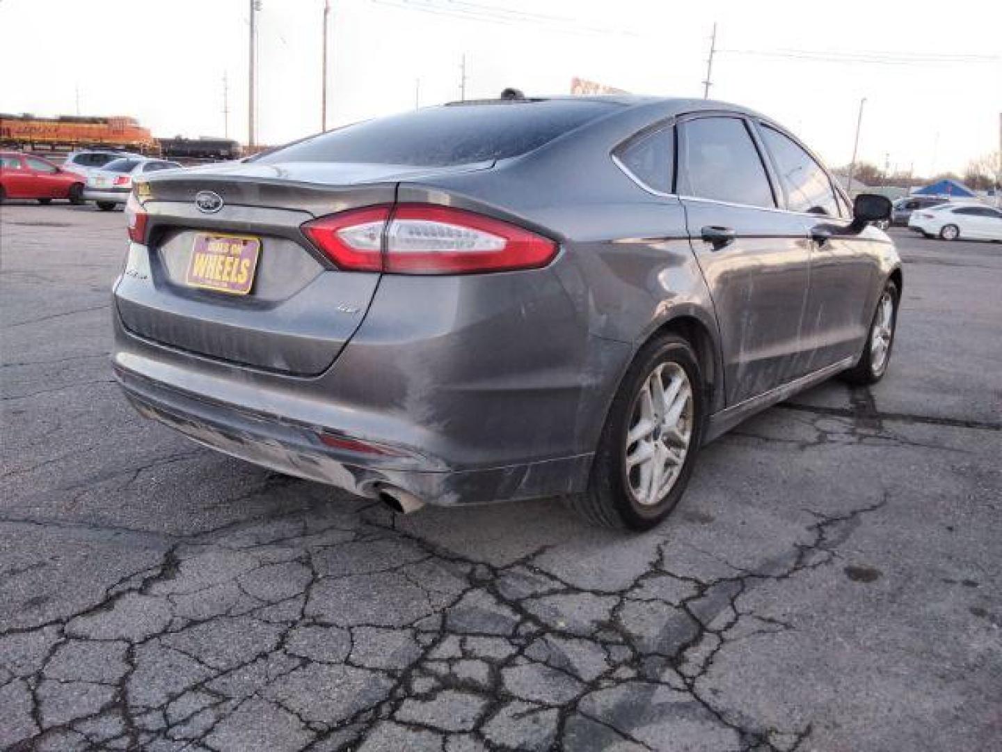 2013 Ford Fusion SE (3FA6P0H75DR) with an 2.5L L4 DOHC 16V engine, located at 4047 Montana Ave., Billings, MT, 59101, 45.770847, -108.529800 - Photo#4