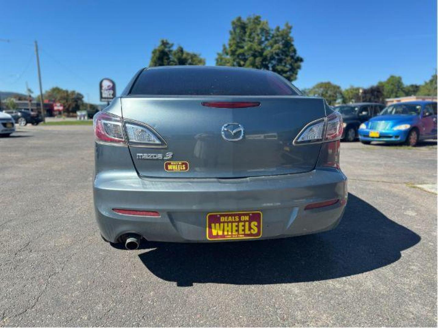 2013 Mazda MAZDA3 i SV MT 4-Door (JM1BL1TGXD1) with an 2.0L L4 DOHC 16V engine, 5-Speed Manual transmission, located at 601 E. Idaho St., Kalispell, MT, 59901, 0.000000, 0.000000 - Photo#3