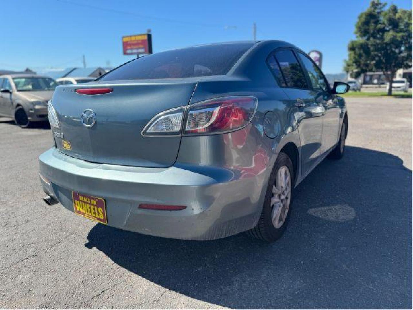 2013 Mazda MAZDA3 i SV MT 4-Door (JM1BL1TGXD1) with an 2.0L L4 DOHC 16V engine, 5-Speed Manual transmission, located at 601 E. Idaho St., Kalispell, MT, 59901, 0.000000, 0.000000 - Photo#4