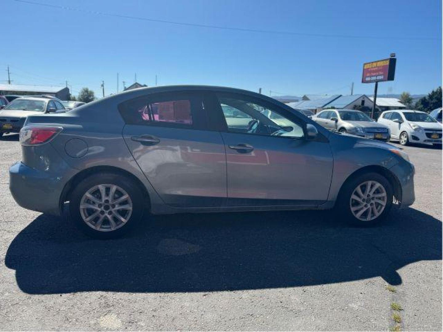 2013 Mazda MAZDA3 i SV MT 4-Door (JM1BL1TGXD1) with an 2.0L L4 DOHC 16V engine, 5-Speed Manual transmission, located at 601 E. Idaho St., Kalispell, MT, 59901, 0.000000, 0.000000 - Photo#5