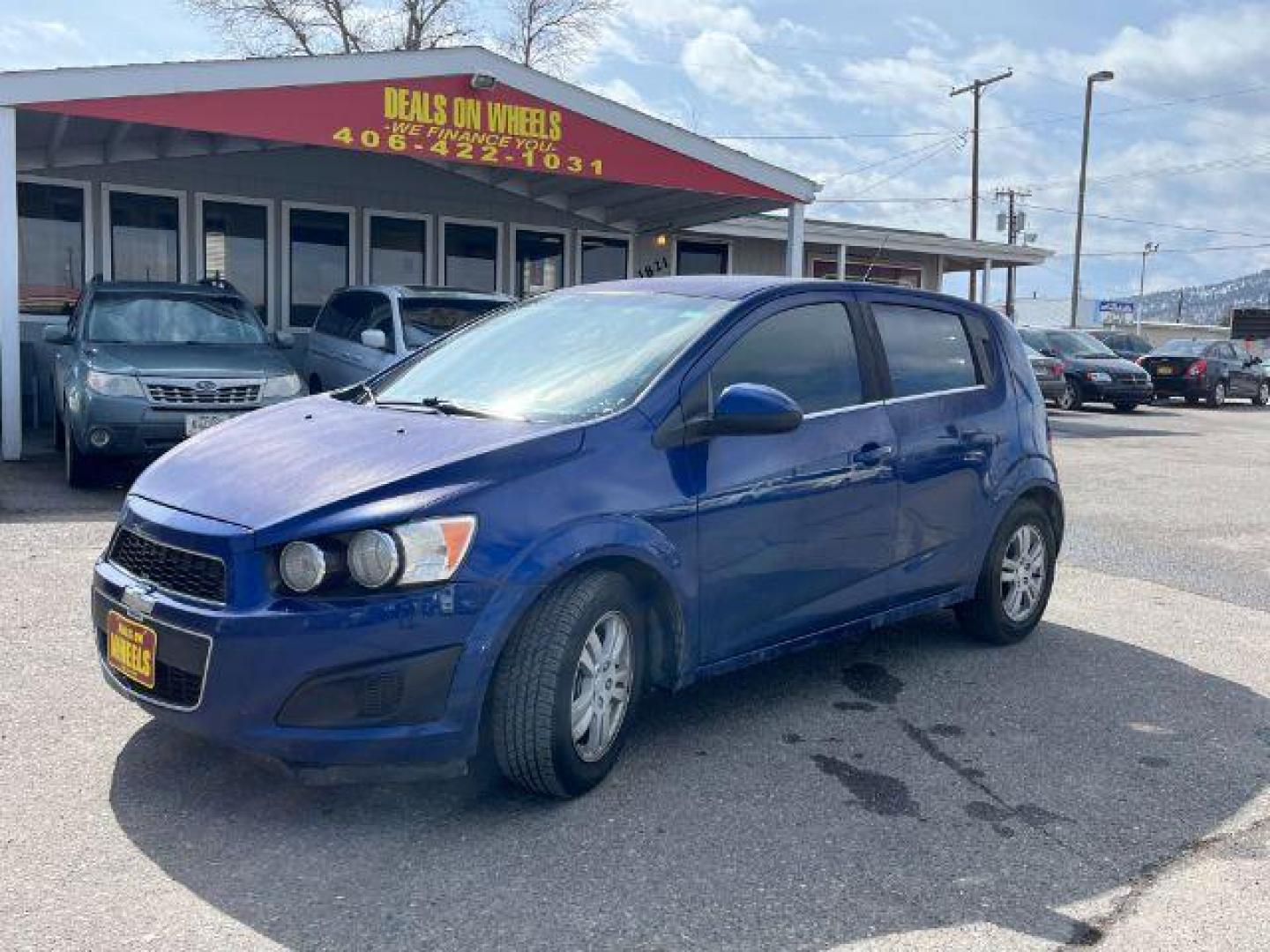 2014 Chevrolet Sonic LT Auto 5-Door (1G1JC6SG9E4) with an 1.8L L4 DOHC 24V engine, 6-Speed Automatic transmission, located at 1821 N Montana Ave., Helena, MT, 59601, 0.000000, 0.000000 - Photo#0