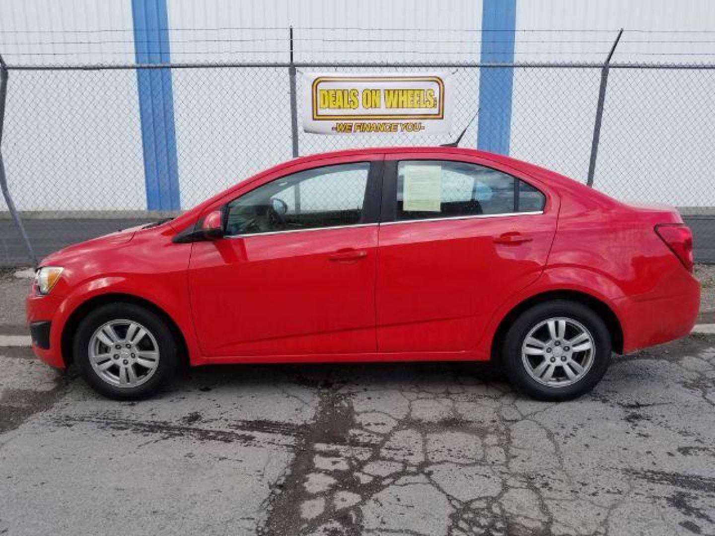 2014 Chevrolet Sonic LT Auto Sedan (1G1JC5SH2E4) with an 1.8L L4 DOHC 24V engine, 6-Speed Automatic transmission, located at 1800 West Broadway, Missoula, 59808, (406) 543-1986, 46.881348, -114.023628 - Photo#2