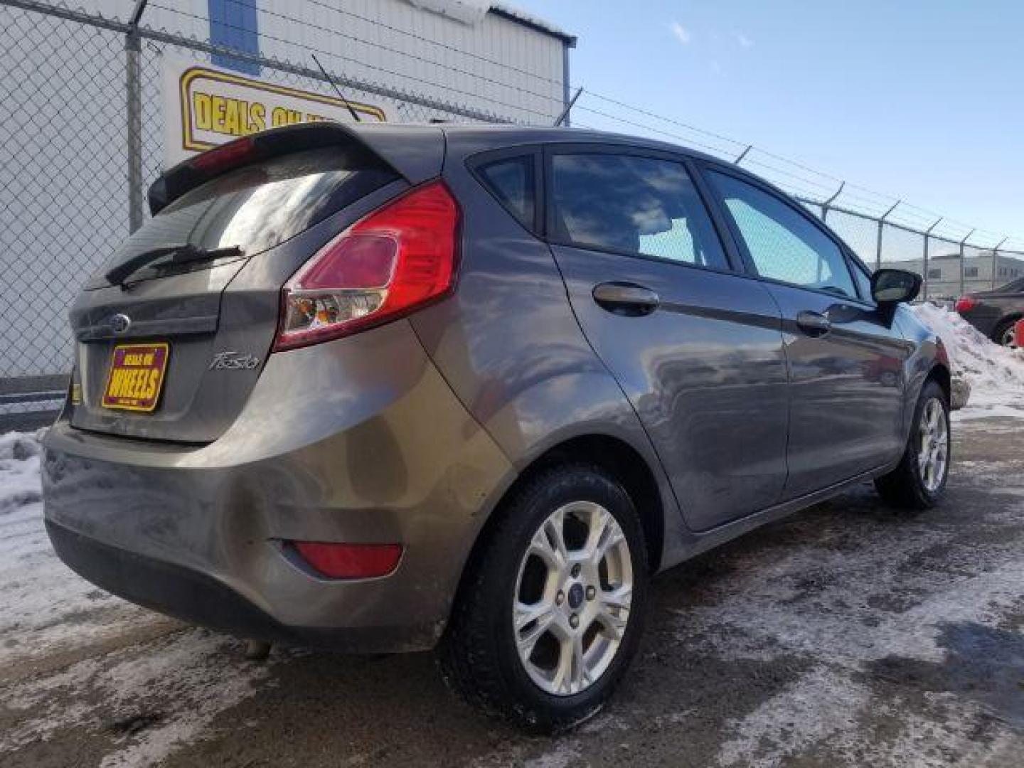 2014 Ford Fiesta SE Hatchback (3FADP4EJ7EM) with an 1.6L L4 DOHC 16V engine, located at 1800 West Broadway, Missoula, 59808, (406) 543-1986, 46.881348, -114.023628 - Photo#4