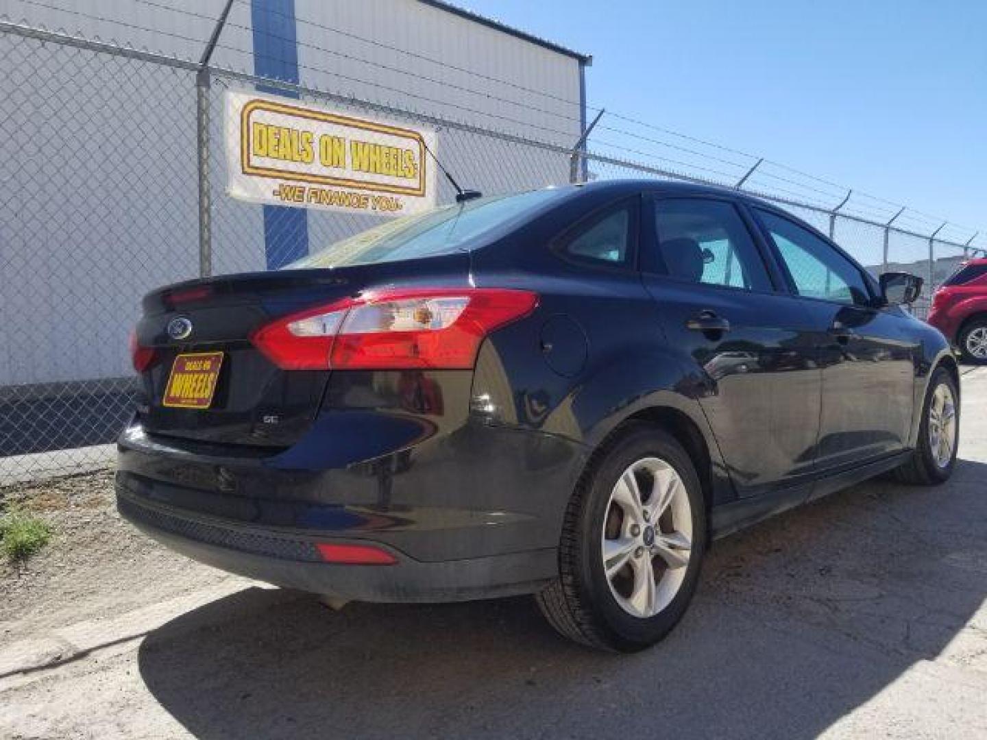 2014 Ford Focus SE Sedan (1FADP3F20EL) with an 2.0L L4 DOHC 16V engine, located at 4801 10th Ave S,, Great Falls, MT, 59405, 0.000000, 0.000000 - Photo#11