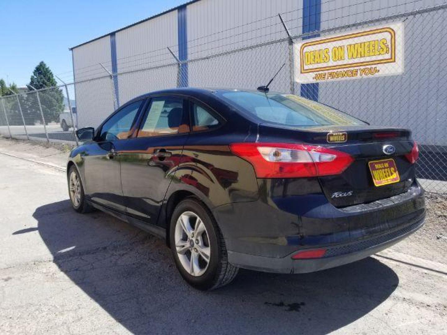 2014 Ford Focus SE Sedan (1FADP3F20EL) with an 2.0L L4 DOHC 16V engine, located at 4801 10th Ave S,, Great Falls, MT, 59405, 0.000000, 0.000000 - Photo#13