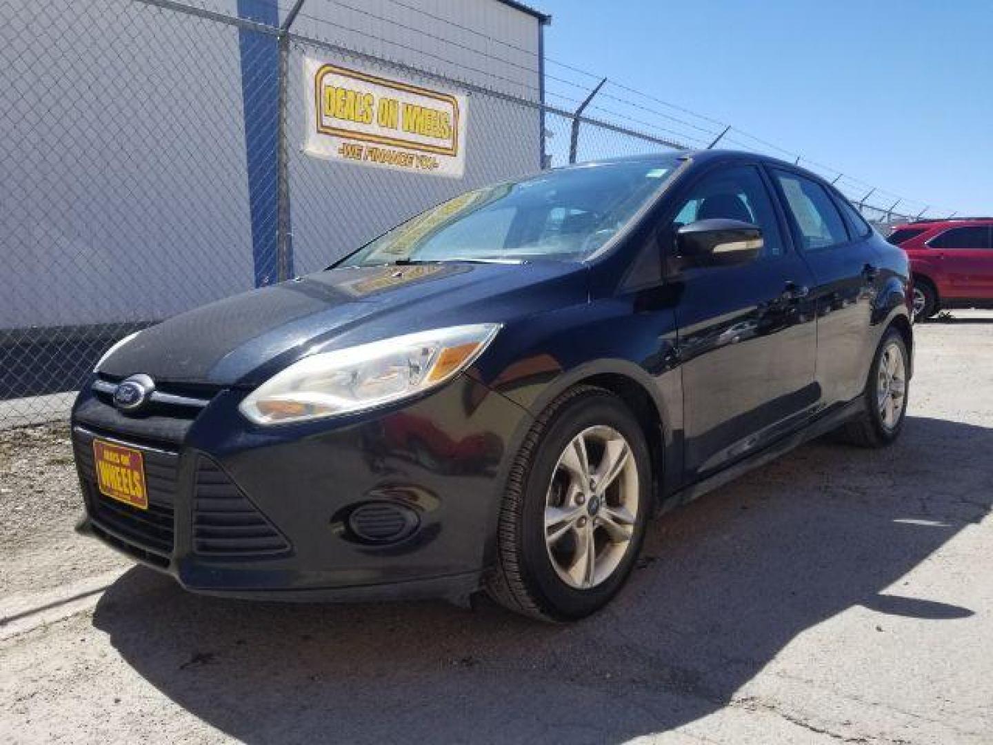 2014 Ford Focus SE Sedan (1FADP3F20EL) with an 2.0L L4 DOHC 16V engine, located at 4801 10th Ave S,, Great Falls, MT, 59405, 0.000000, 0.000000 - Photo#0