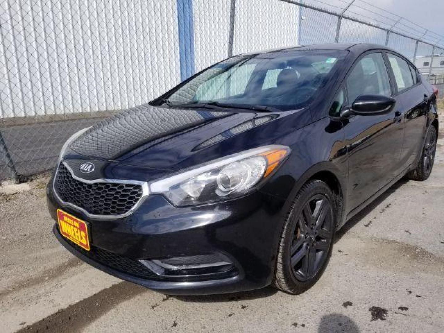 2014 Kia Forte LX M6 (KNAFK4A67E5) with an 1.8L L4 DOHC 16V engine, 6-Speed Manual transmission, located at 4047 Montana Ave., Billings, MT, 59101, 45.770847, -108.529800 - Photo#0