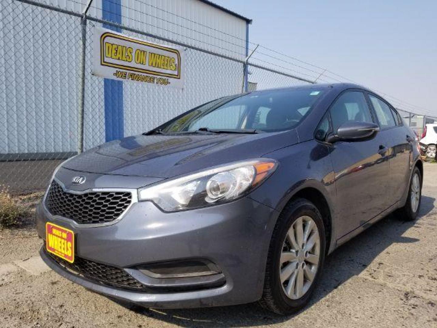 2014 Kia Forte EX (KNAFX4A66E5) with an 1.8L L4 DOHC 16V engine, 6-Speed Automatic transmission, located at 4047 Montana Ave., Billings, MT, 59101, 45.770847, -108.529800 - Photo#0