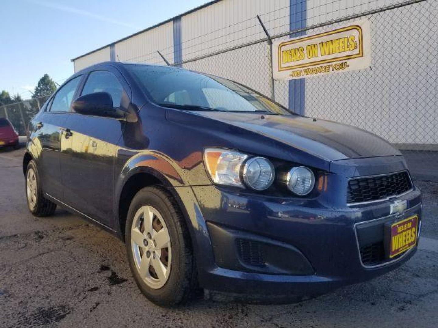 2015 Chevrolet Sonic LS Auto Sedan (1G1JA5SH5F4) with an 1.8L L4 DOHC 24V engine, 6-Speed Automatic transmission, located at 4047 Montana Ave., Billings, MT, 59101, 45.770847, -108.529800 - Photo#2