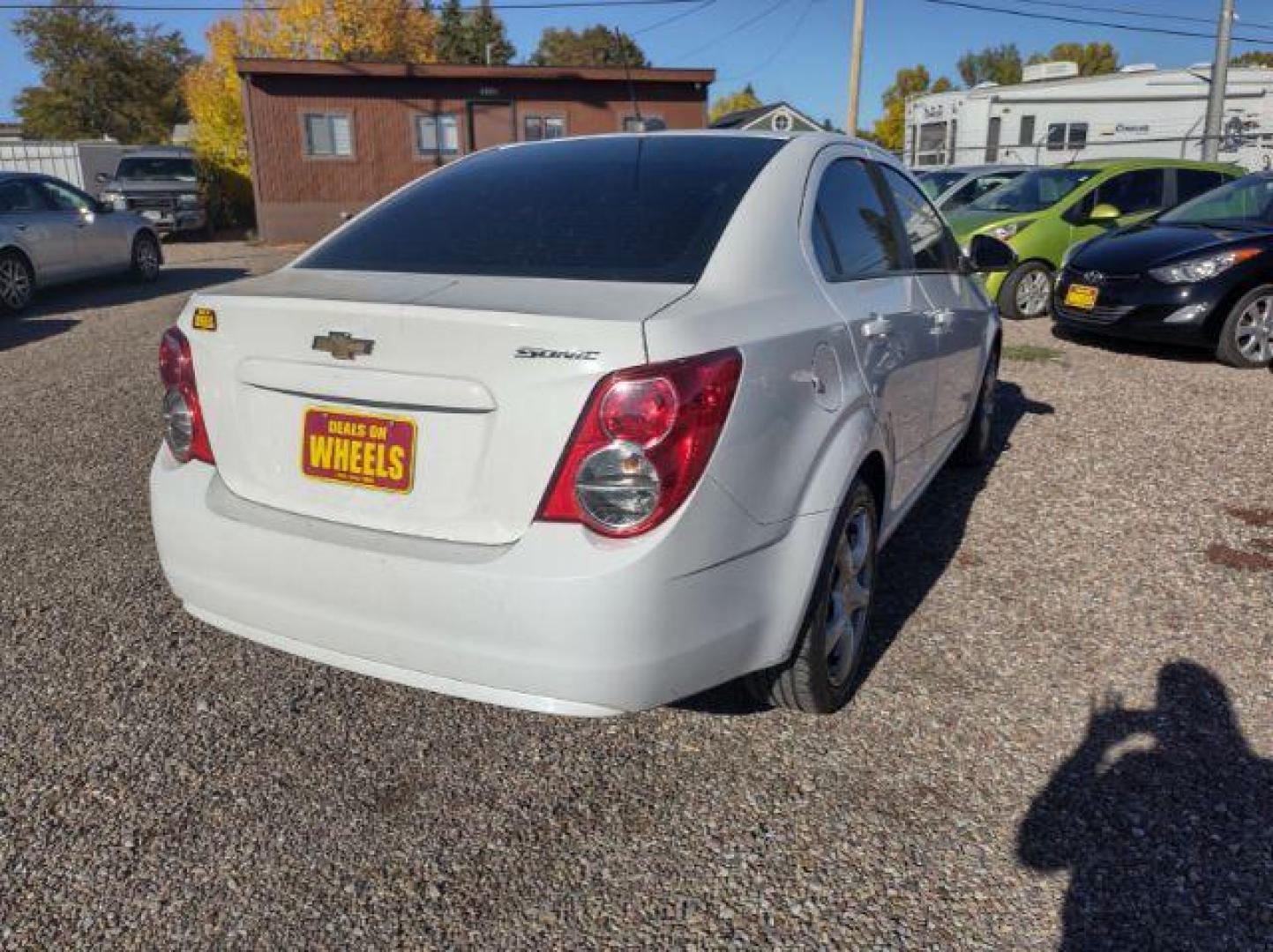 2015 Chevrolet Sonic LS Auto Sedan (1G1JA5SG2F4) with an 1.8L L4 DOHC 24V engine, 6-Speed Automatic transmission, located at 4801 10th Ave S,, Great Falls, MT, 59405, 0.000000, 0.000000 - Photo#4