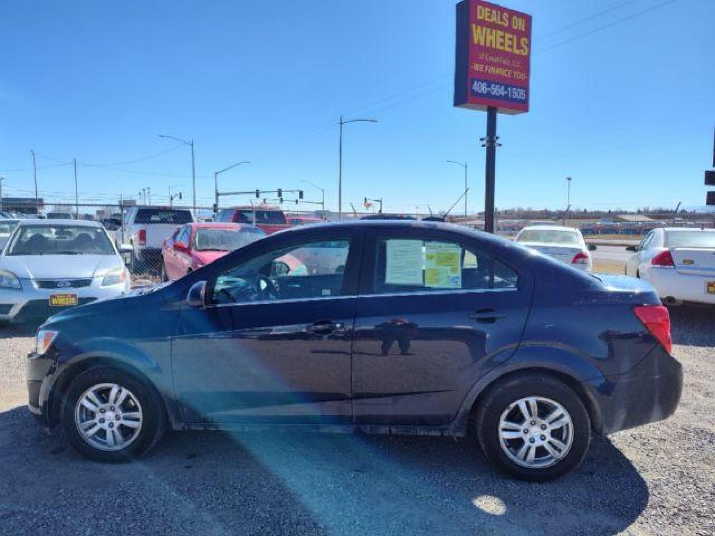 2015 Chevrolet Sonic LT Auto Sedan (1G1JC5SHXF4) with an 1.8L L4 DOHC 24V engine, 6-Speed Automatic transmission, located at 4801 10th Ave S,, Great Falls, MT, 59405, 0.000000, 0.000000 - Photo#1