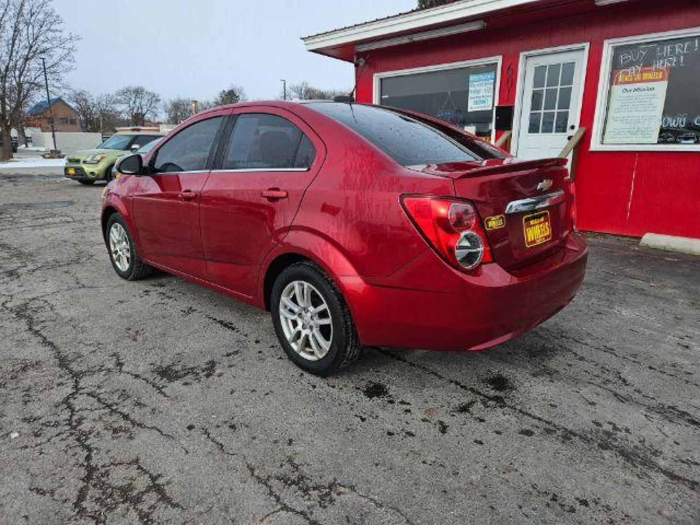 2015 Chevrolet Sonic LT Auto Sedan (1G1JC5SH4F4) with an 1.8L L4 DOHC 24V engine, 6-Speed Automatic transmission, located at 601 E. Idaho St., Kalispell, MT, 59901, 0.000000, 0.000000 - Photo#2