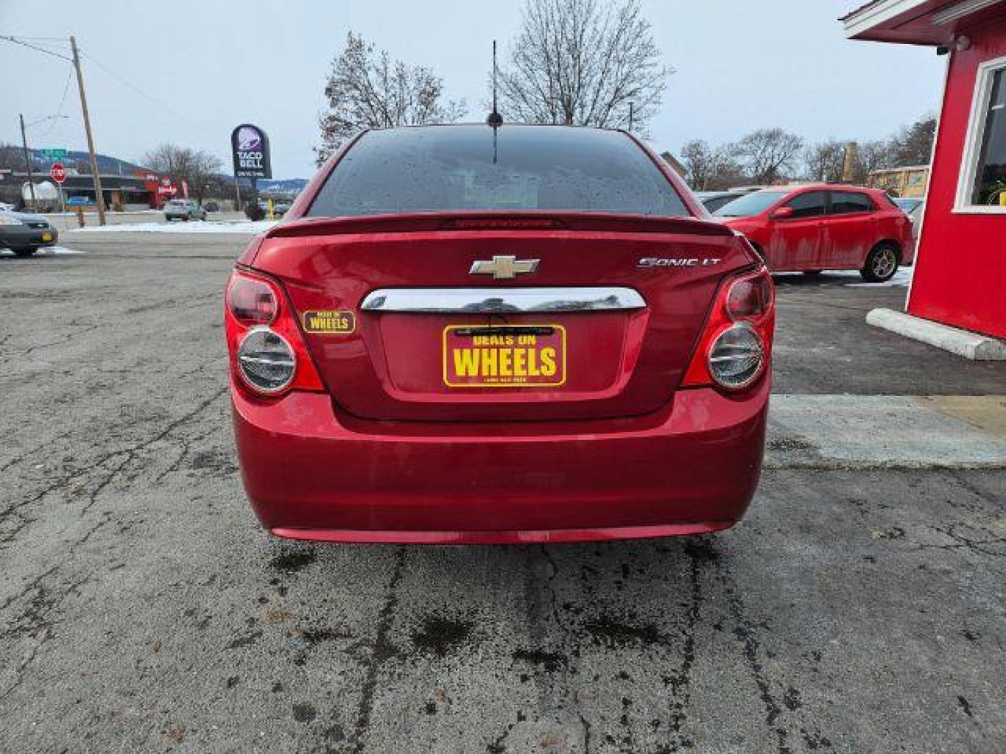 2015 Chevrolet Sonic LT Auto Sedan (1G1JC5SH4F4) with an 1.8L L4 DOHC 24V engine, 6-Speed Automatic transmission, located at 601 E. Idaho St., Kalispell, MT, 59901, 0.000000, 0.000000 - Photo#3