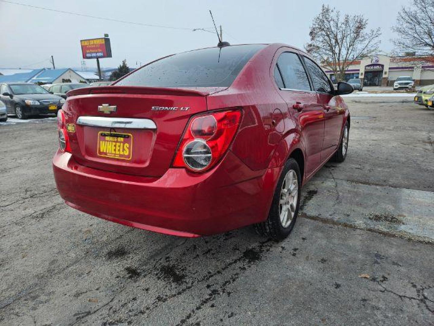 2015 Chevrolet Sonic LT Auto Sedan (1G1JC5SH4F4) with an 1.8L L4 DOHC 24V engine, 6-Speed Automatic transmission, located at 601 E. Idaho St., Kalispell, MT, 59901, 0.000000, 0.000000 - Photo#4