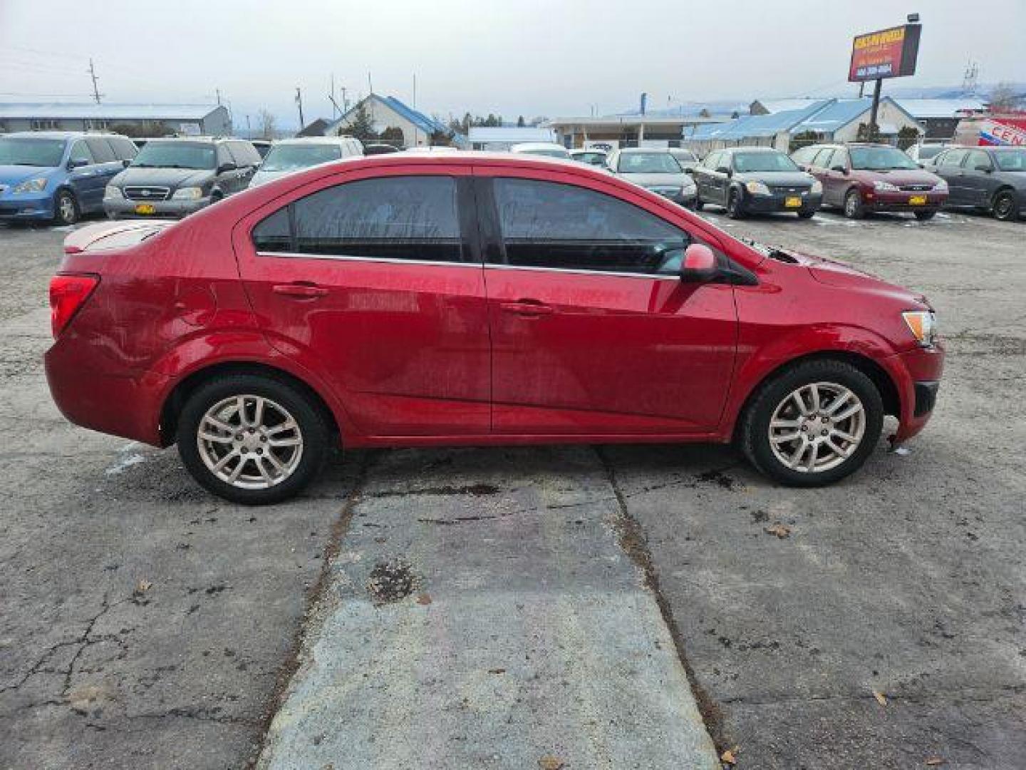 2015 Chevrolet Sonic LT Auto Sedan (1G1JC5SH4F4) with an 1.8L L4 DOHC 24V engine, 6-Speed Automatic transmission, located at 601 E. Idaho St., Kalispell, MT, 59901, 0.000000, 0.000000 - Photo#5