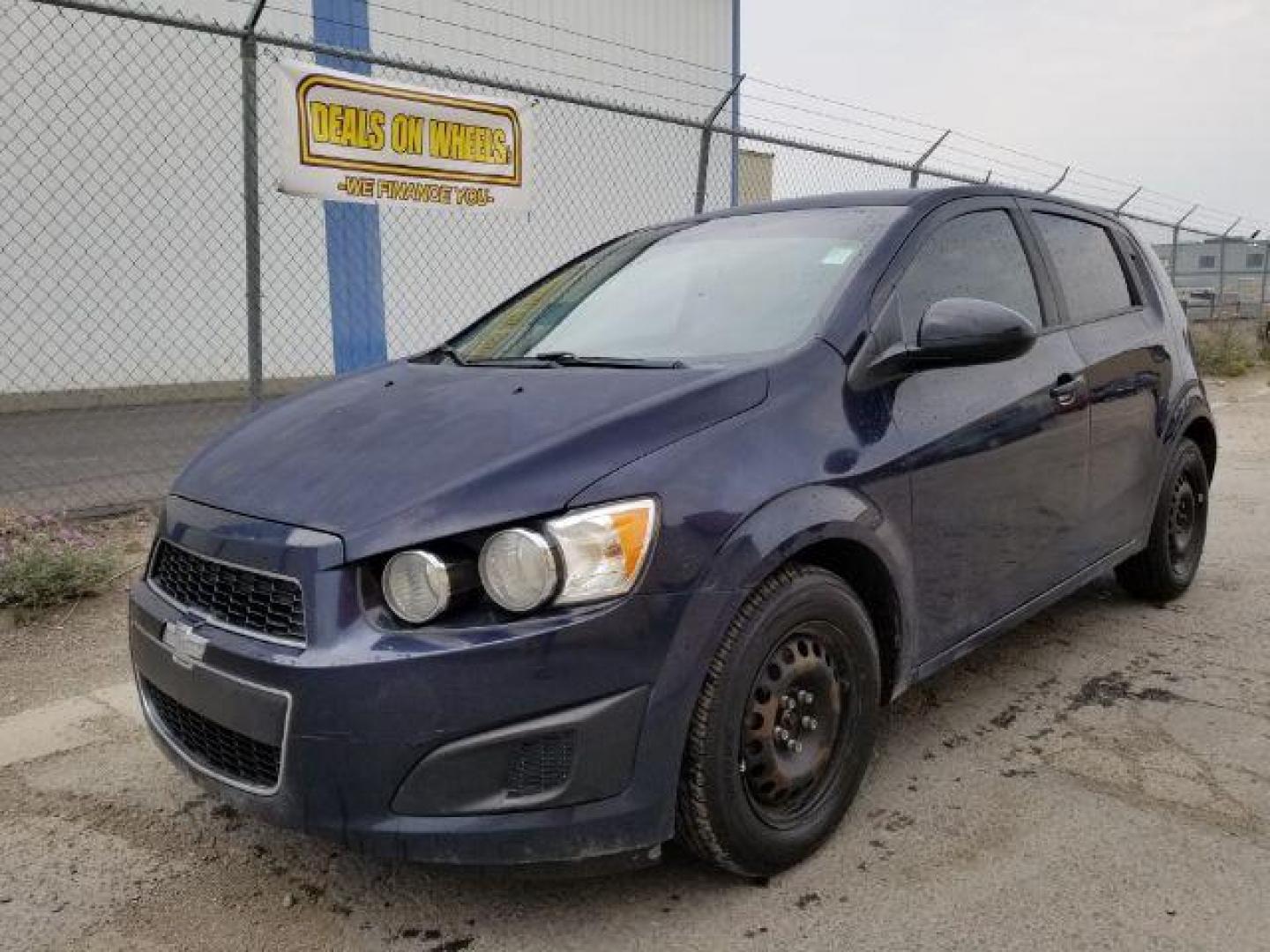 2015 Chevrolet Sonic LS Manual 5-Door (1G1JB6SHXF4) with an 1.8L L4 DOHC 24V engine, 5-Speed Manual transmission, located at 1800 West Broadway, Missoula, 59808, (406) 543-1986, 46.881348, -114.023628 - Photo#0