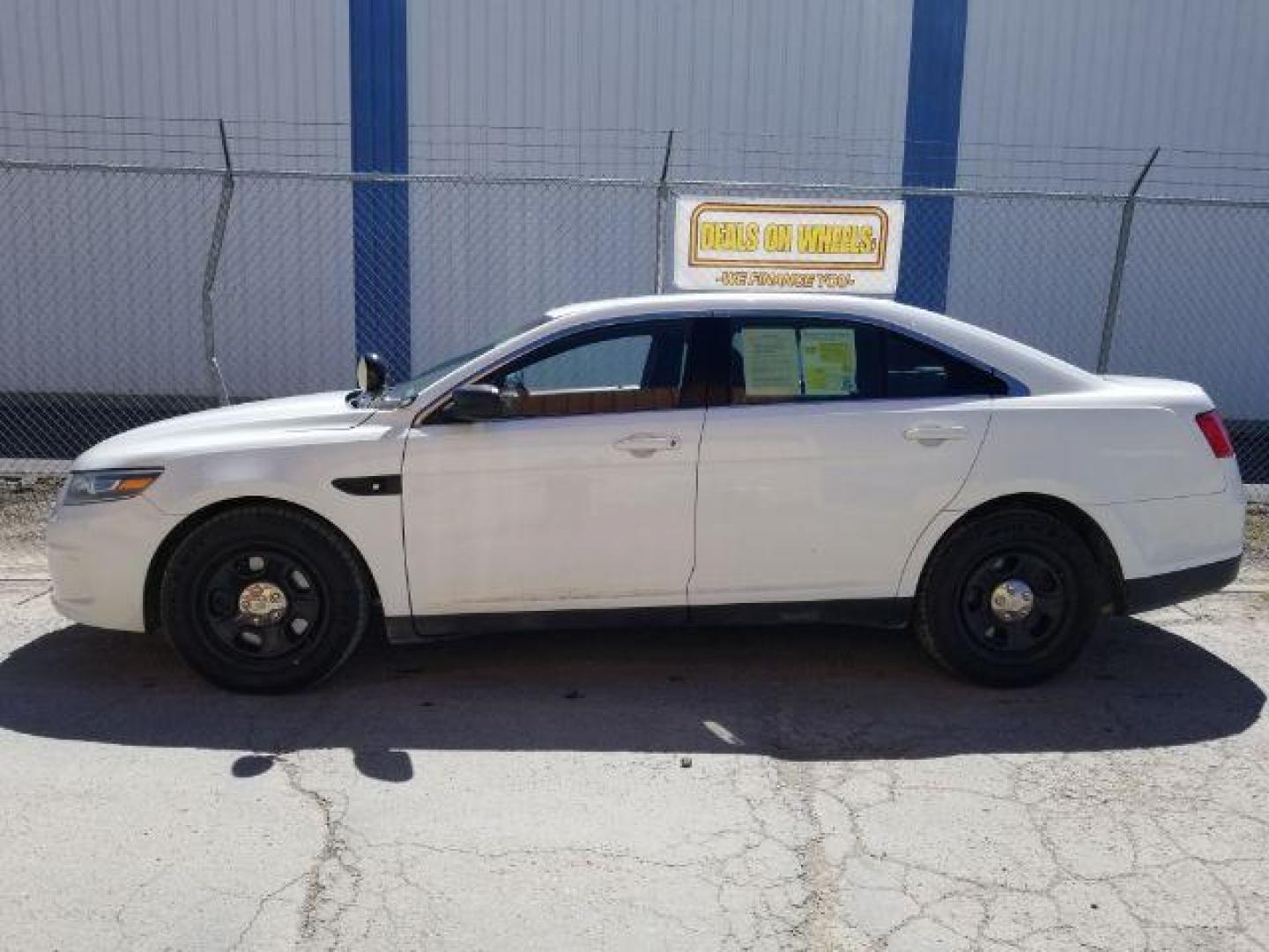 2015 Ford Taurus Police AWD (1FAHP2MKXFG) with an 3.7L V6 DOHC 24V engine, 6-Speed Automatic transmission, located at 1800 West Broadway, Missoula, 59808, (406) 543-1986, 46.881348, -114.023628 - Photo#2